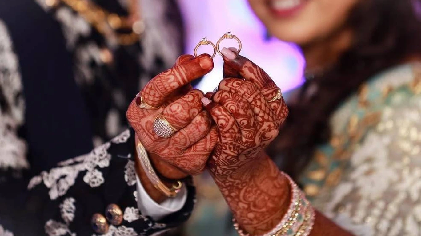 Romantic engagement photography in Patna with couple ring ceremony moment