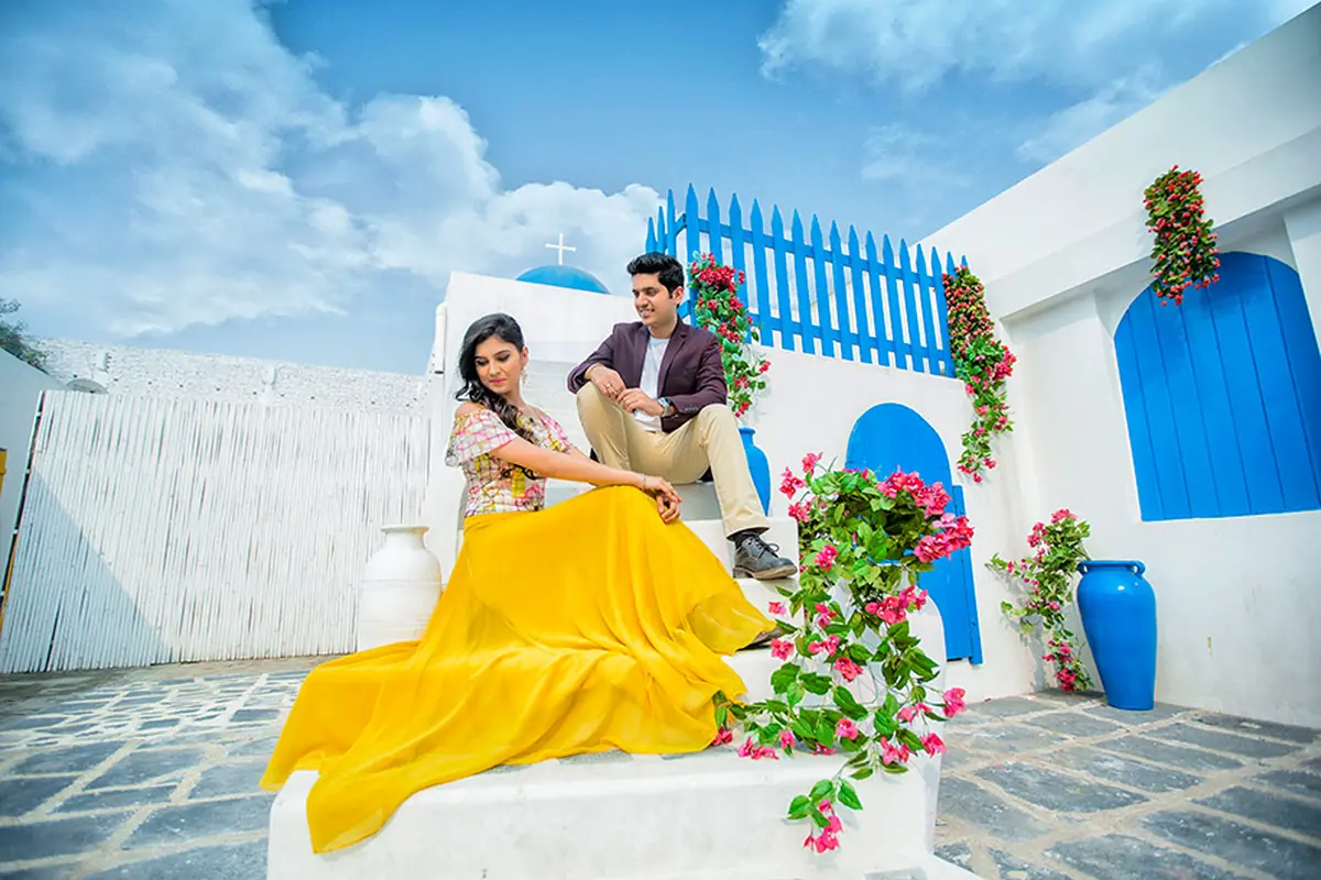 Romantic couple exchanging rings during their engagement, captured by DesignInfo Photography